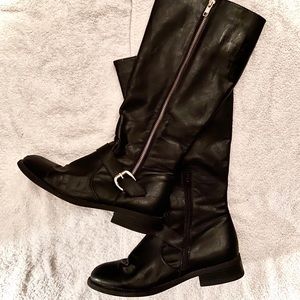 tall black boots w/ gold buckle detailing